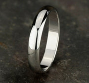 The Oro 18K White Gold Wedding Band with Domed Polished Finish 4mm Forged Union