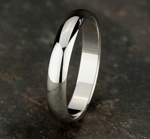 The Oro 18K White Gold Wedding Band with Domed Polished Finish 4mm Forged Union