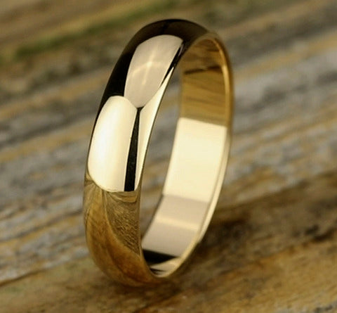The Aure 18K Yellow Gold Wedding Band with Domed Polished Finish 5mm