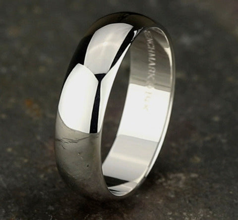 The Solis 18K White Gold Wedding Band with Domed Polished Finish 6mm Forged Union