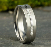 The Frost Platinum Satin Wedding Band With 18 Round Diamonds 6mm Forged Union