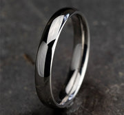 The Taro 18K White Gold Domed Wedding Band with Polished Finish 4 mm Forged Union