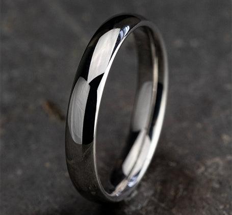 The Taro 18K White Gold Domed Wedding Band with Polished Finish 4 mm Forged Union
