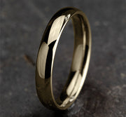 The Taro 18K Yellow Gold Domed Wedding Band with Polished Finish 4 mm Forged Union