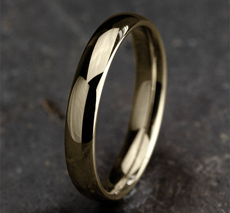 The Taro 18K Yellow Gold Domed Wedding Band with Polished Finish 4 mm Forged Union