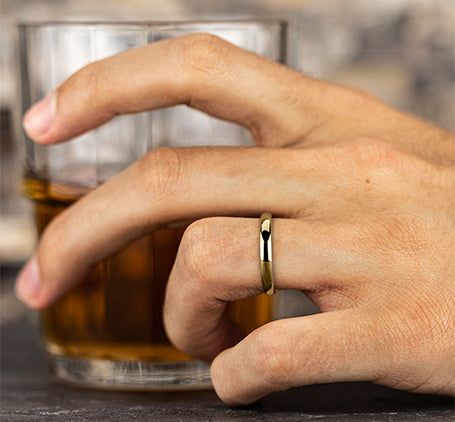 The Taro 18K Yellow Gold Domed Wedding Band with Polished Finish 4 mm