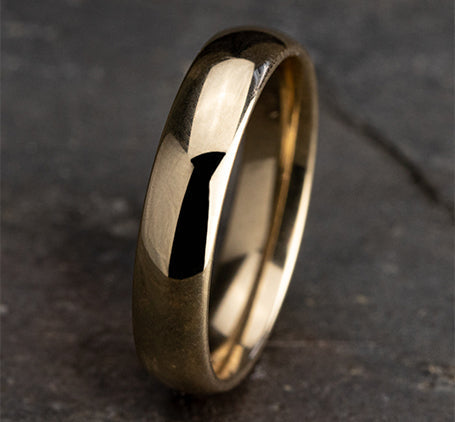 The Veo 18K Yellow Gold Domed Wedding Band with Polished Finish 5 mm Forged Union