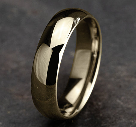 The Elium 18K Yellow Gold Domed Wedding Band with Polished Finish 6 mm Forged Union