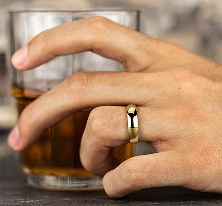 The Elium 18K Yellow Gold Domed Wedding Band with Polished Finish 6 mm Forged Union