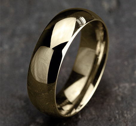 The Ray 18K Yellow Gold Domed Wedding Band with Polished Finish 7 mm Forged Union