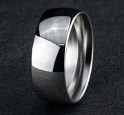 The Lumen 18K White Gold Domed Wedding Band with Polished Finish 8mm Forged Union