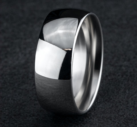 The Lumen 18K White Gold Domed Wedding Band with Polished Finish 8mm Forged Union