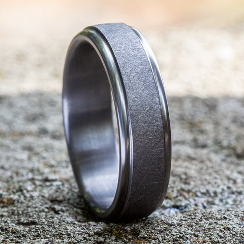 The Ezra Grey Tantalum Swirl Center High-Polish Edge Wedding Band 6.5mm Forged Union